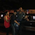 Posing in front of the limo